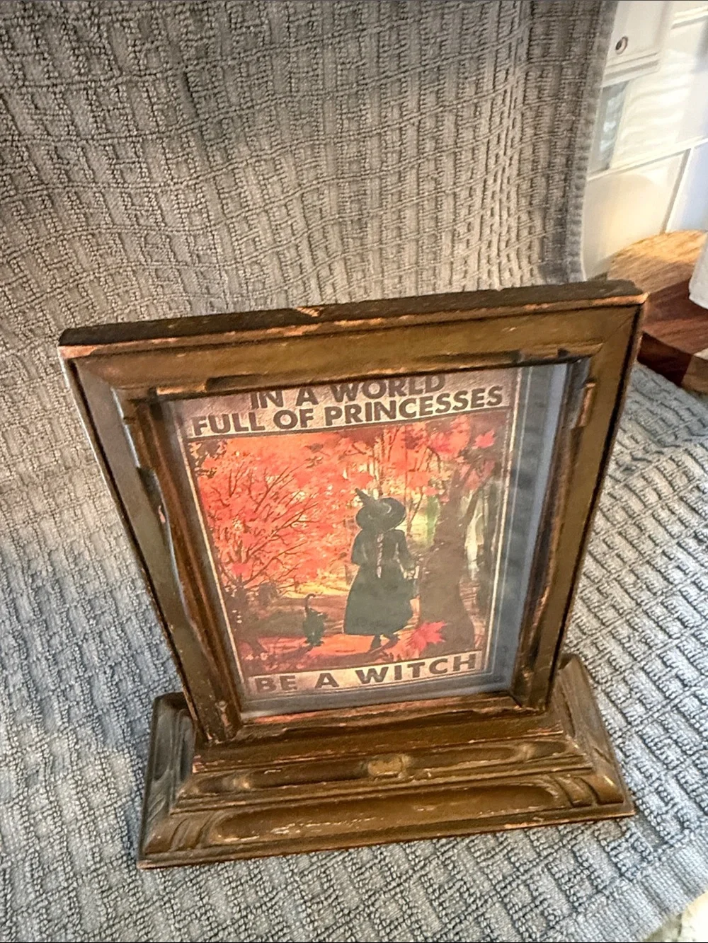 Vintage wood frame on pedestal, bronze/gold color